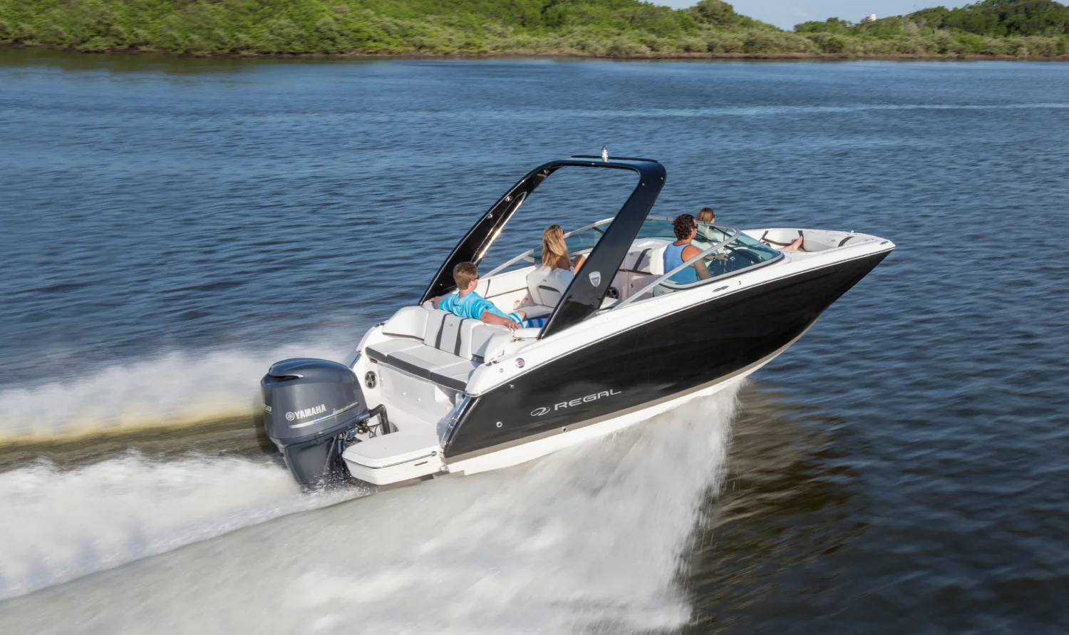 23 Obx Regal on water with family riding